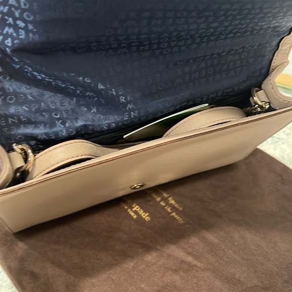 Kate Spade clutch in a taupe leather with laser cutout design. - Picture 2 of 5